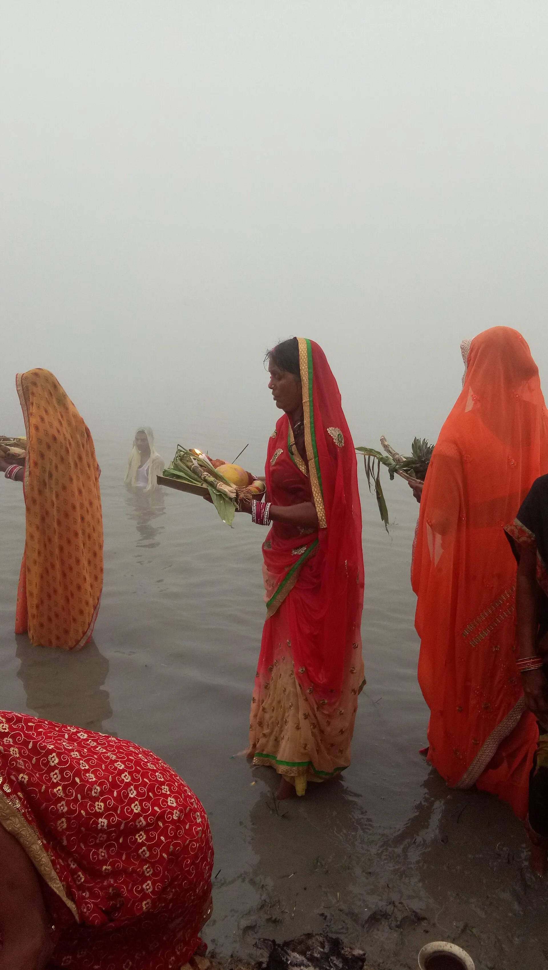Women making Chhath offerings in Gannipur Bhanpur, Vaishali.